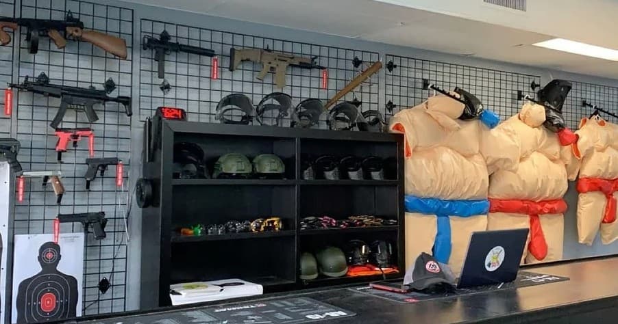 Counter and gear display with helmets and novelty suits inside venue