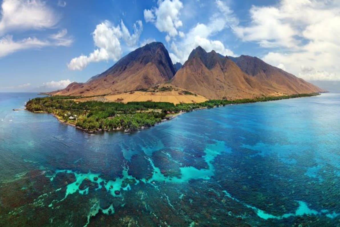 Aerial island reef and turquoise waters near Maui coast