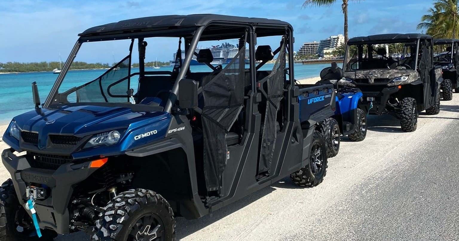 Line of off-road UTVs parked ready for Bahamian island adventure