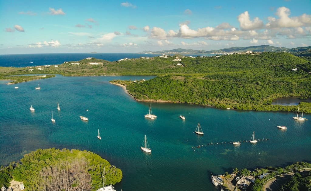 Aerial view of sailboats and turquoise coastline in St. Croix