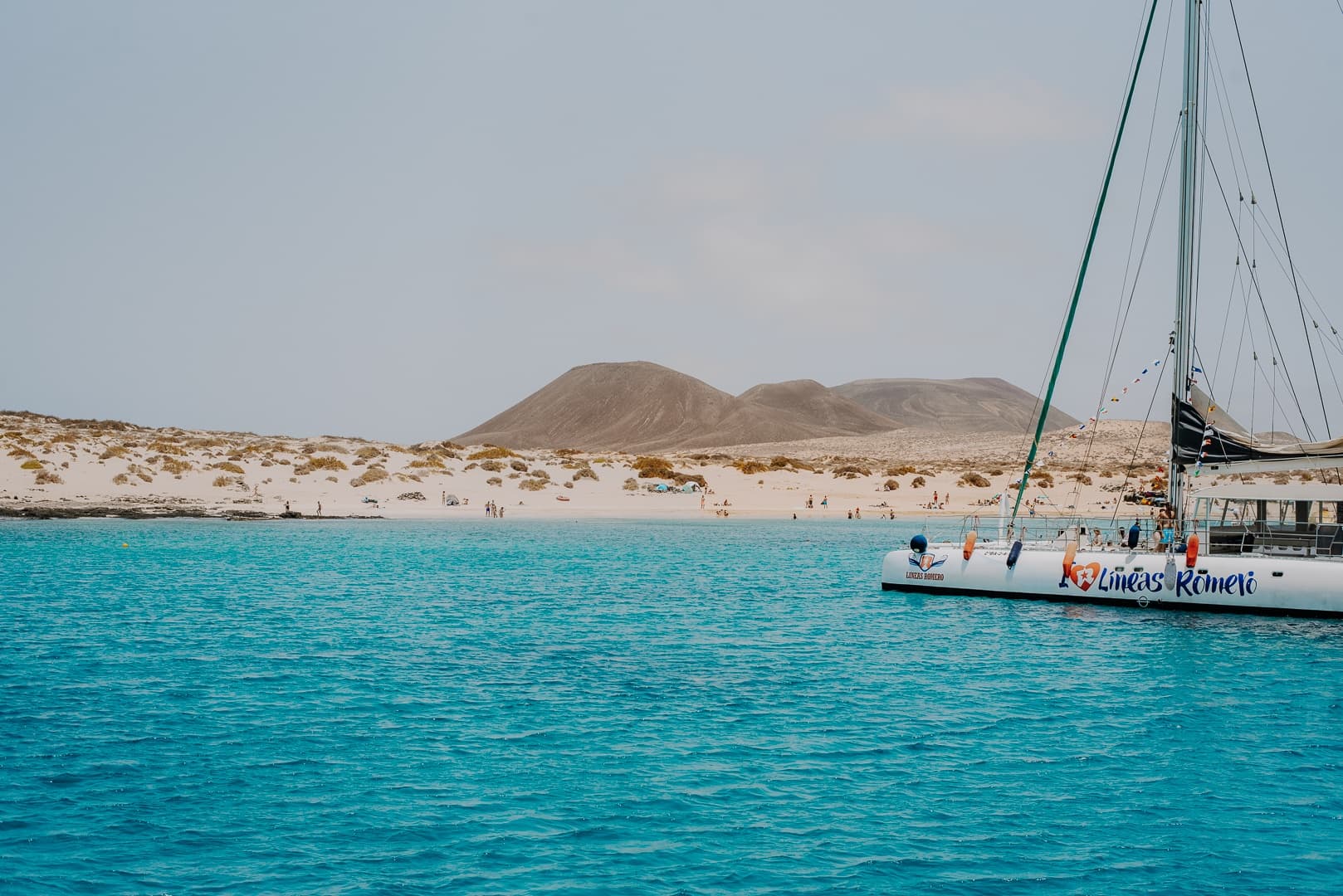 Catamaran to La Graciosa: Paella, Kayaks & Playa Francesa from Órzola