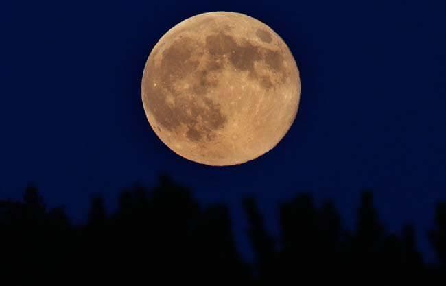 Full moon over Key West skyline for nighttime ghost tours