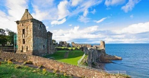 Coastal St Andrews castle ruins overlooking North Sea cliffs