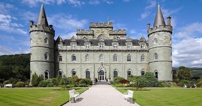 Historic Scottish castle estate with manicured grounds, tours