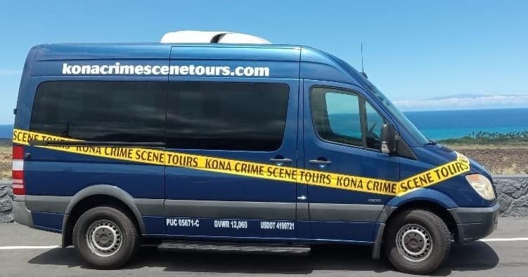 Crime scene tour van parked along Kona coastline for scenic tours