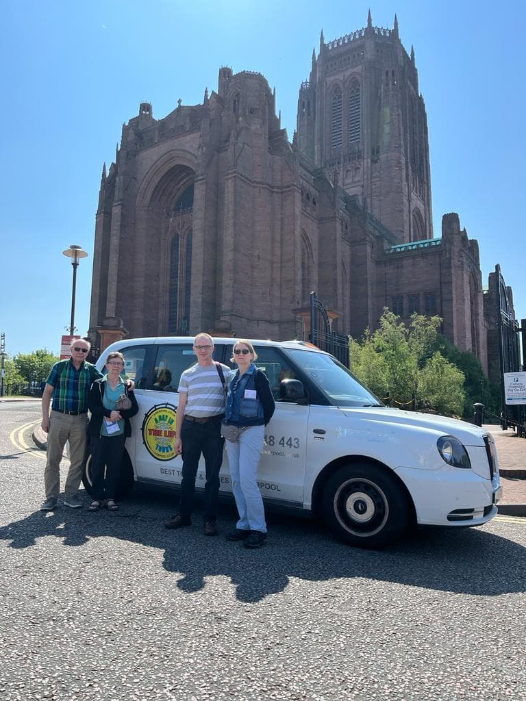 Small group tour by Liverpool Cathedral with tour taxi