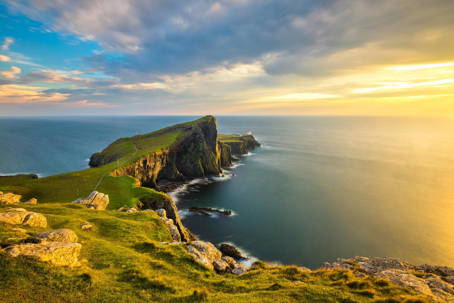 Cliffside coastal hike along dramatic Scottish island headlands