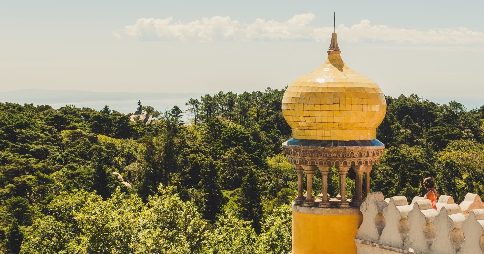Scenic palace dome amid forested hillside for cultural sightseeing