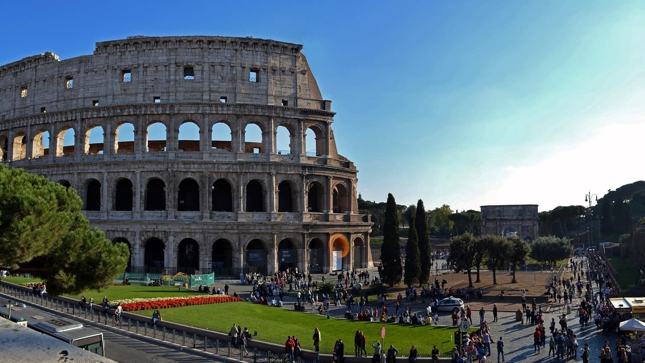 Wide exterior view of the Colosseum amphitheater, iconic Rome landmark