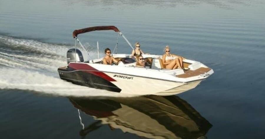 Speedboat cruising with passengers on calm Naples coastal waters