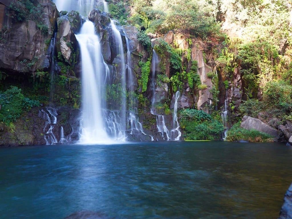 Waterfall and plunge pool at Reunion Island, serene swim