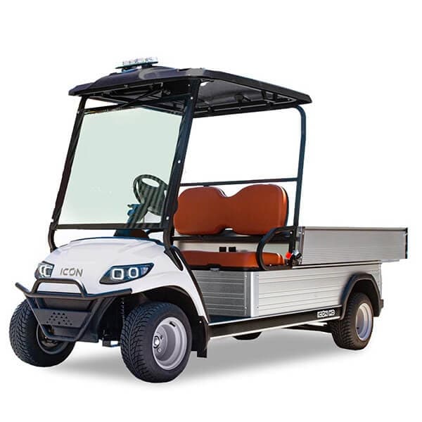 Utility cargo golf cart with cargo bed on white studio floor