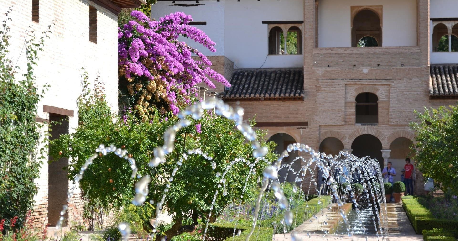 Generalife garden fountains and floral arches at Alhambra