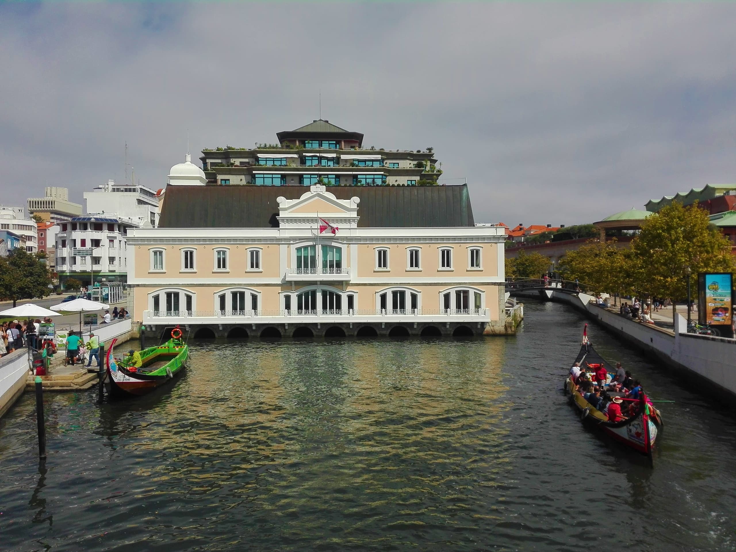 Waterside historic building with traditional boats in Portugal