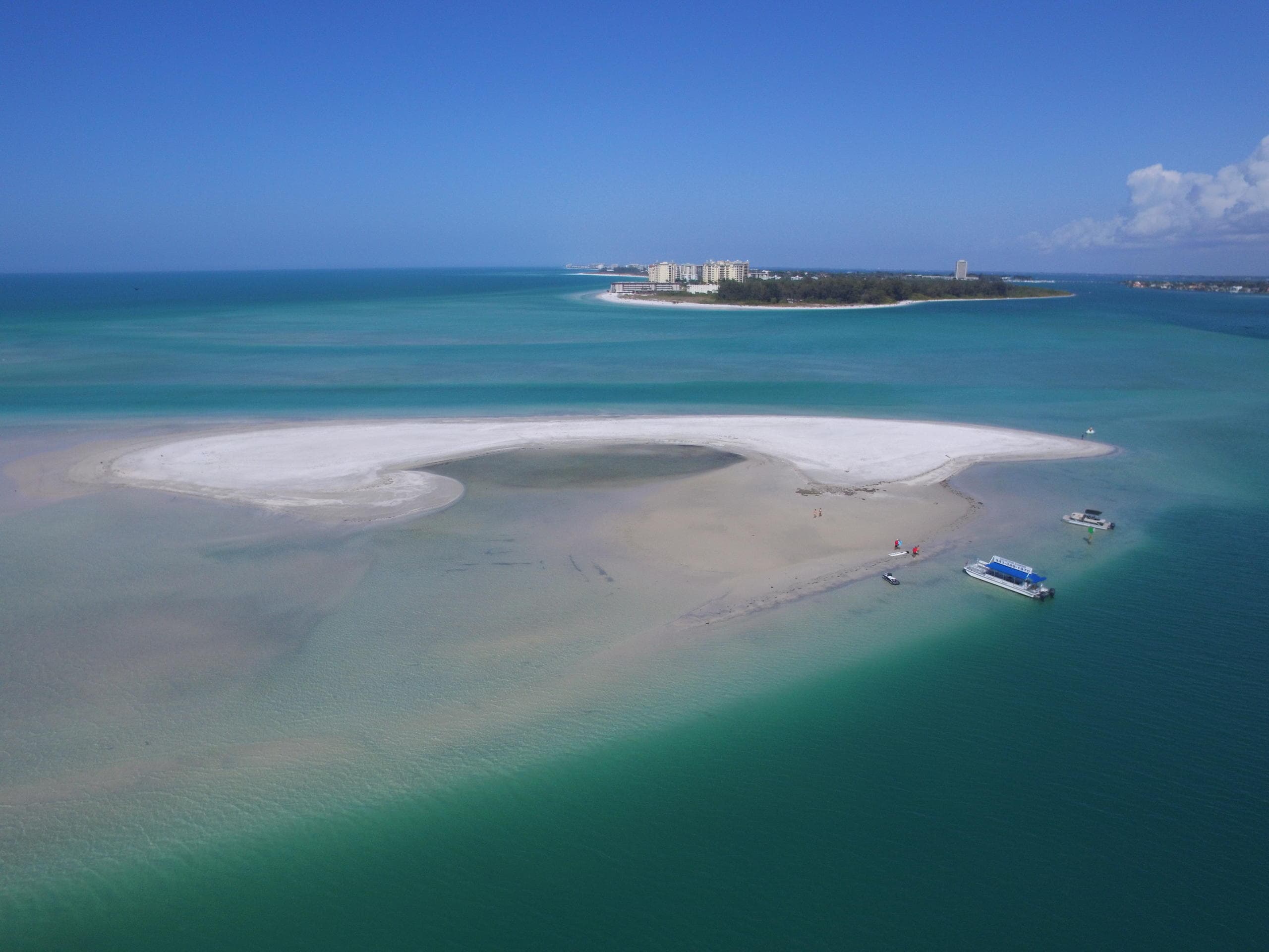 Aerial view of sandbar and turquoise waters near Florida coast