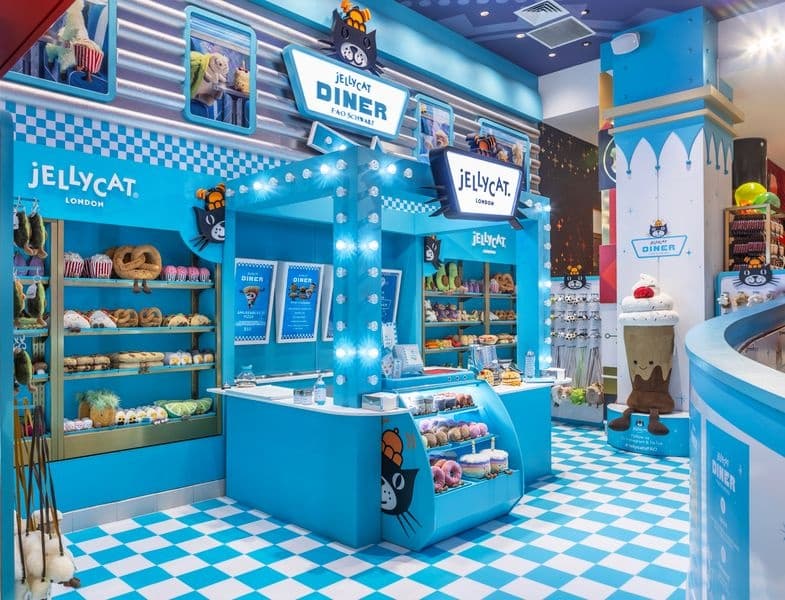 Bright Jellycat themed candy-diner interior display at FAO Schwarz