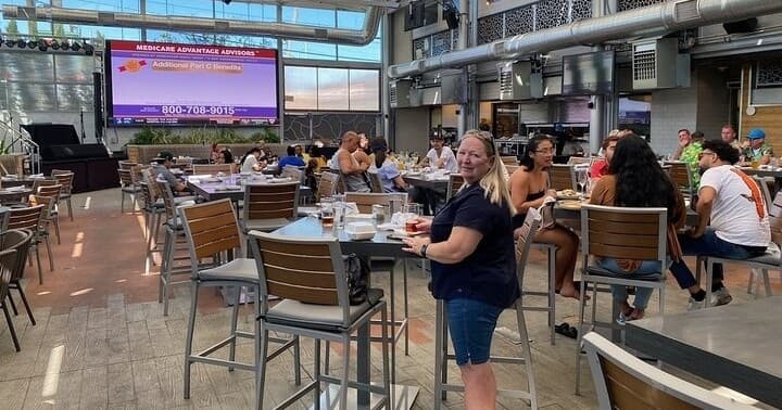 Indoor brewery dining in atrium, casual meals and socializing