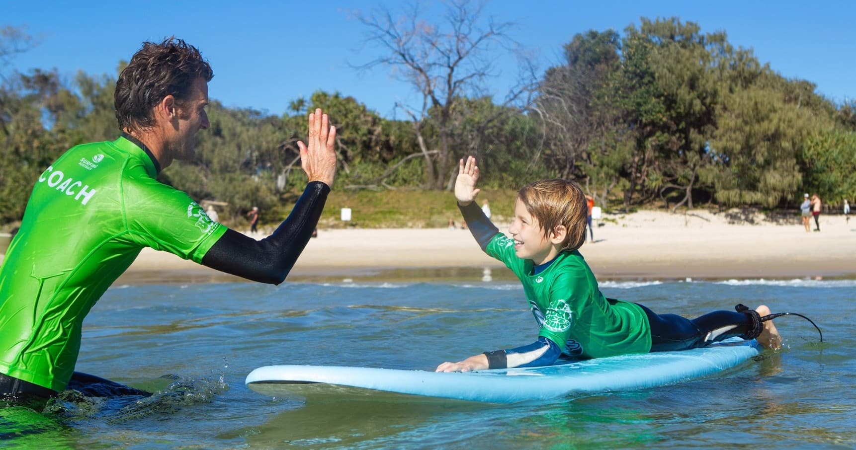 Surf Lessons & SUP at Sawtell Beach with Woolworths SurfGroms