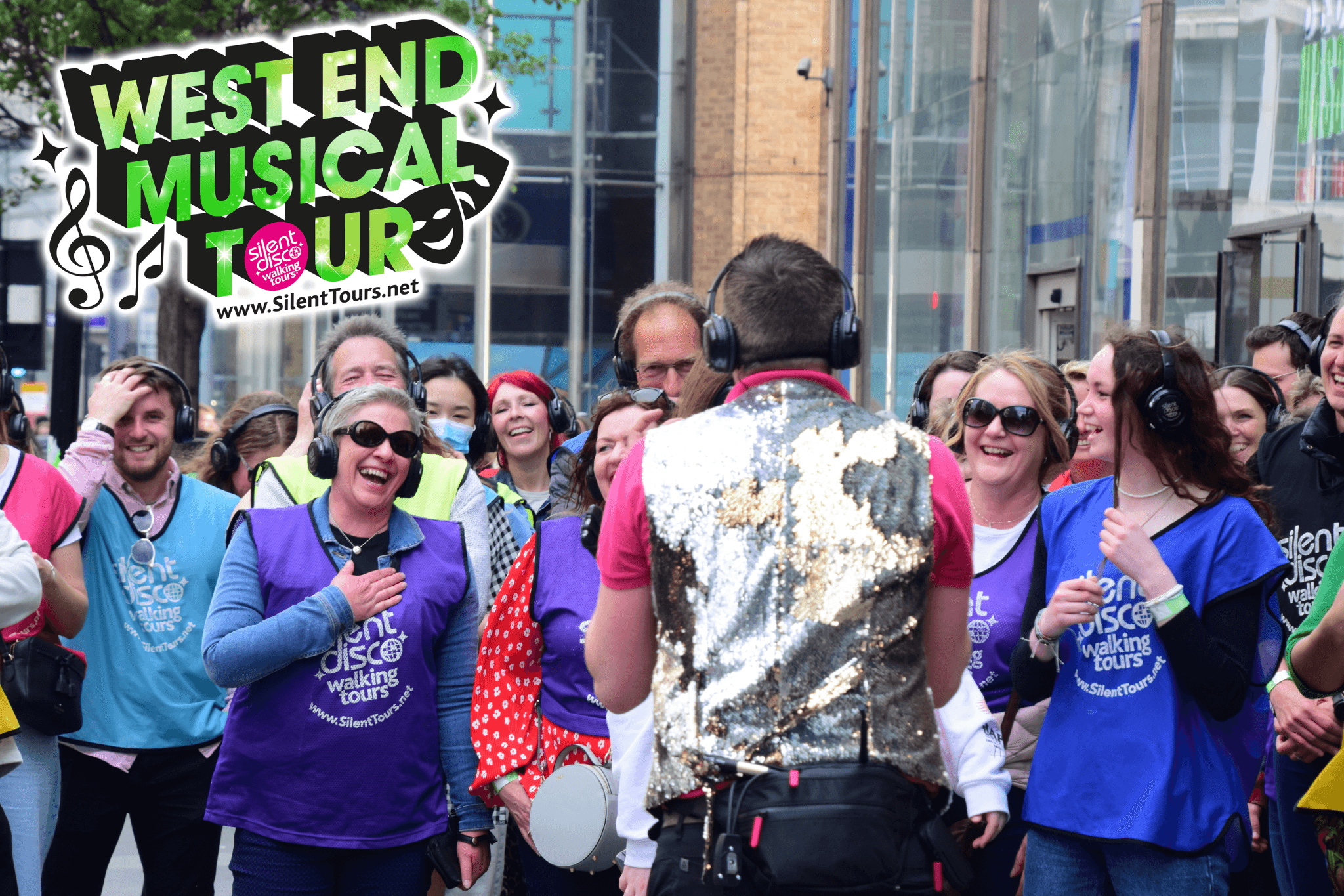 West End musical walking tour group singing on city street