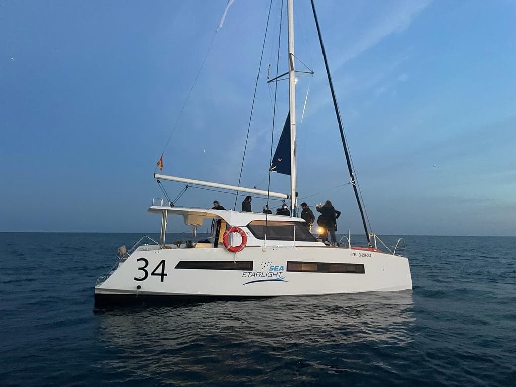 Catamaran charter number 34 cruising open ocean at sea