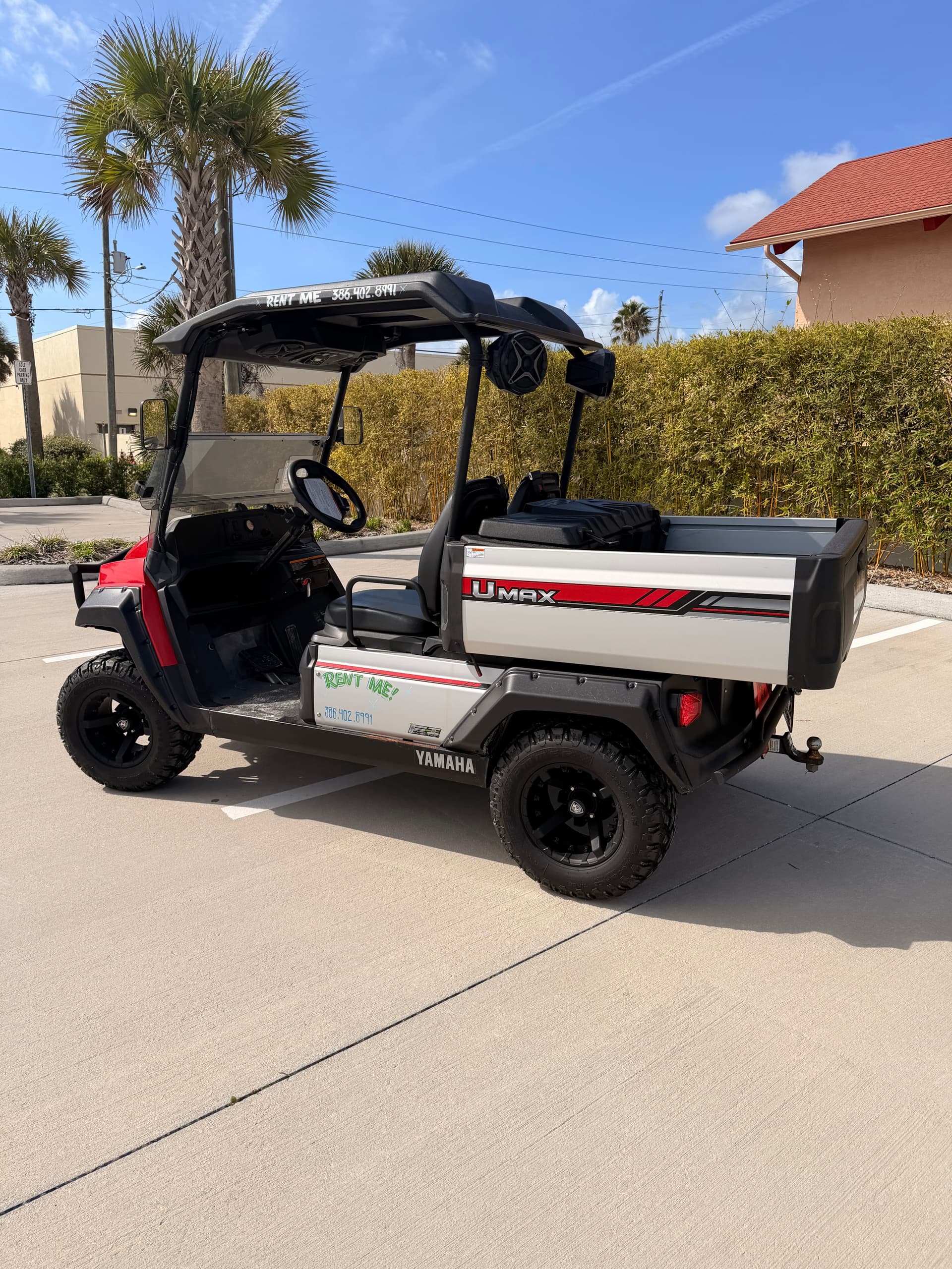 Roll Through New Smyrna Beach: 2 Passenger Golf Cart w/ Speaker Rental photo 2