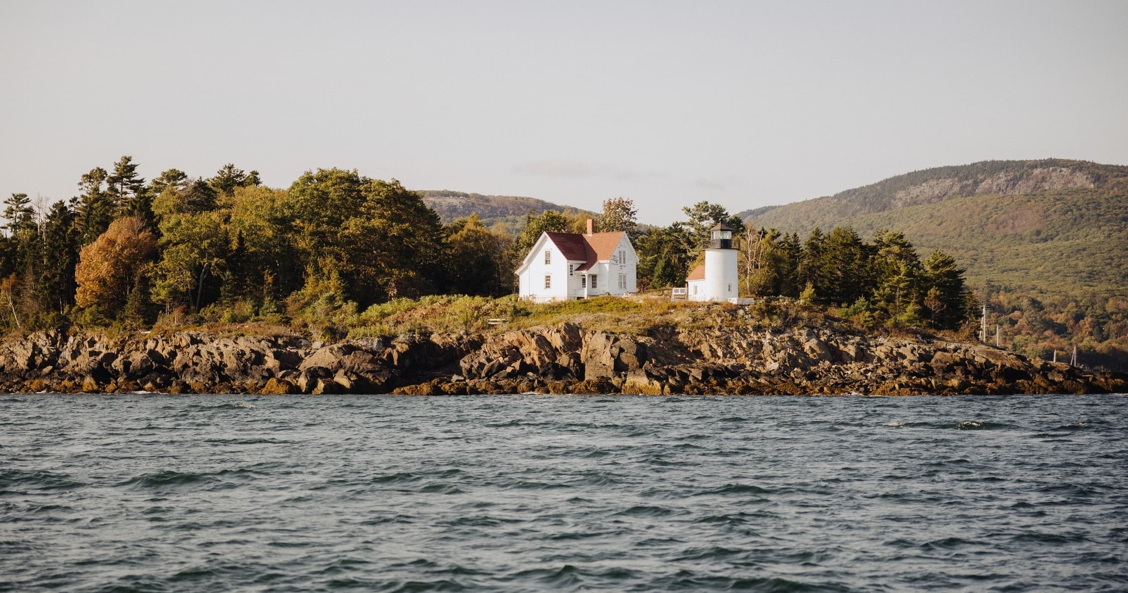 Historic lighthouse and coastal island scenery in Maine