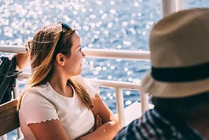 Passengers enjoying scenic bay cruise on a sunny Sarasota harbor