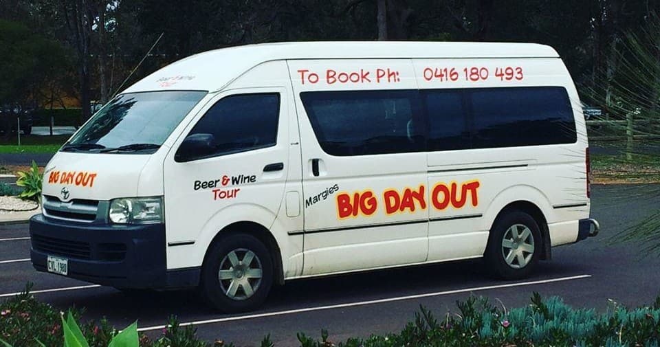 Parked Big Day Out tour van near parkland, Western Australia day tour