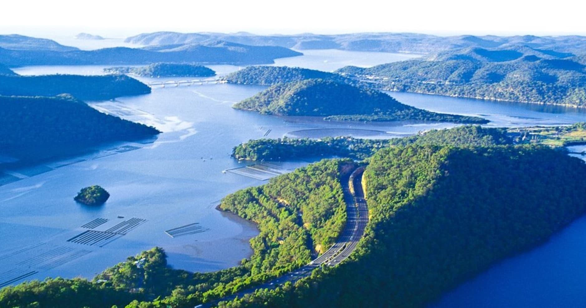 Aerial view of winding river and islands, scenic river cruise