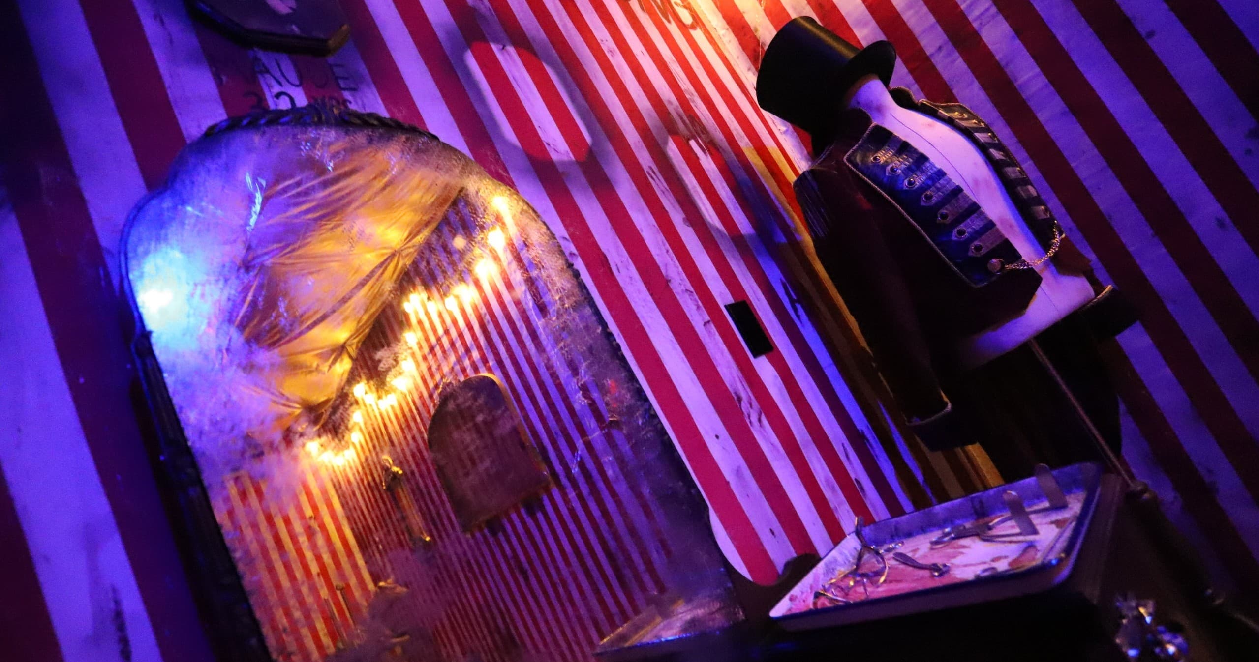 Indoor themed escape room set with mannequin and vintage props
