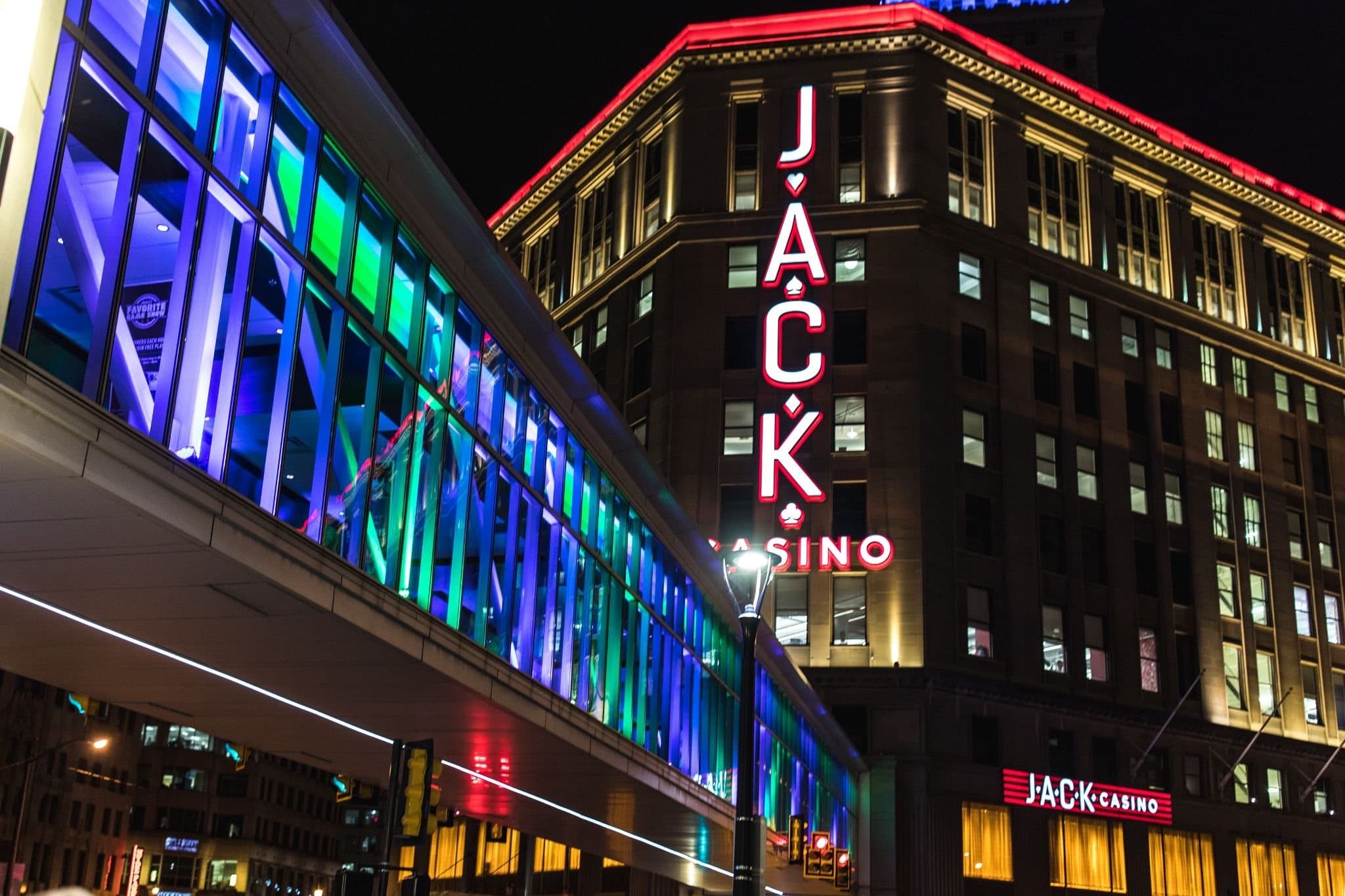 JACK Casino neon-lit skywalk and urban streetscape at night