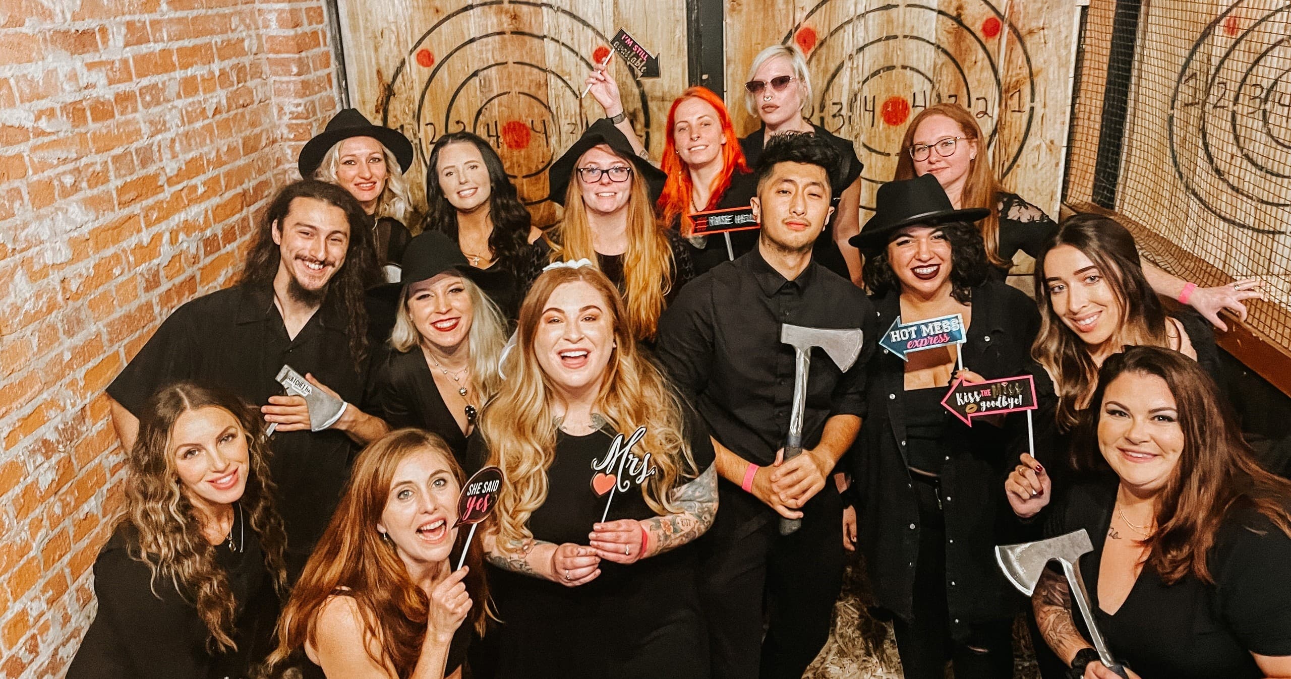 Large group celebrating axe throwing at Ellicottville venue