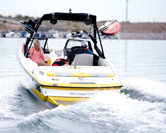 High-speed powerboat creating wake on Pleasant Harbor waters