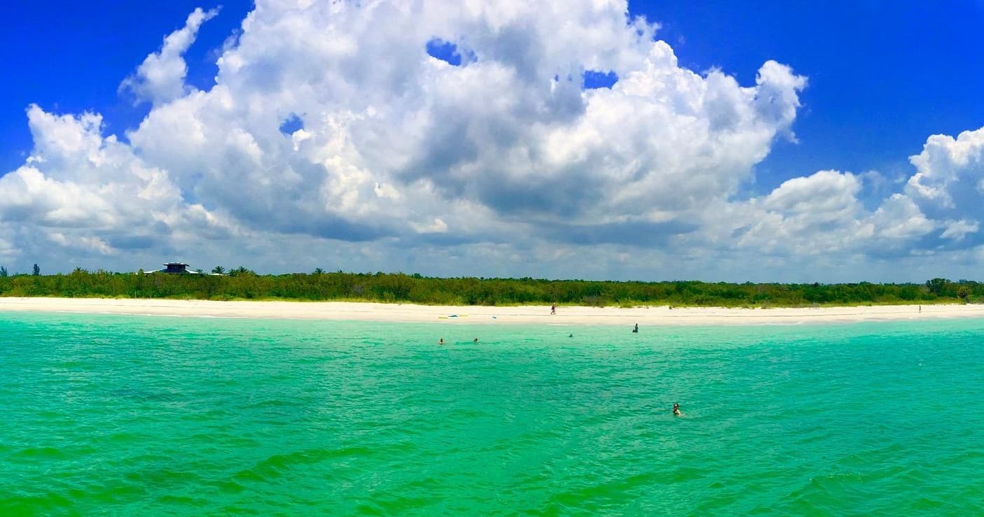 Crystal shallow turquoise waters and sandy flats, snorkeling spot