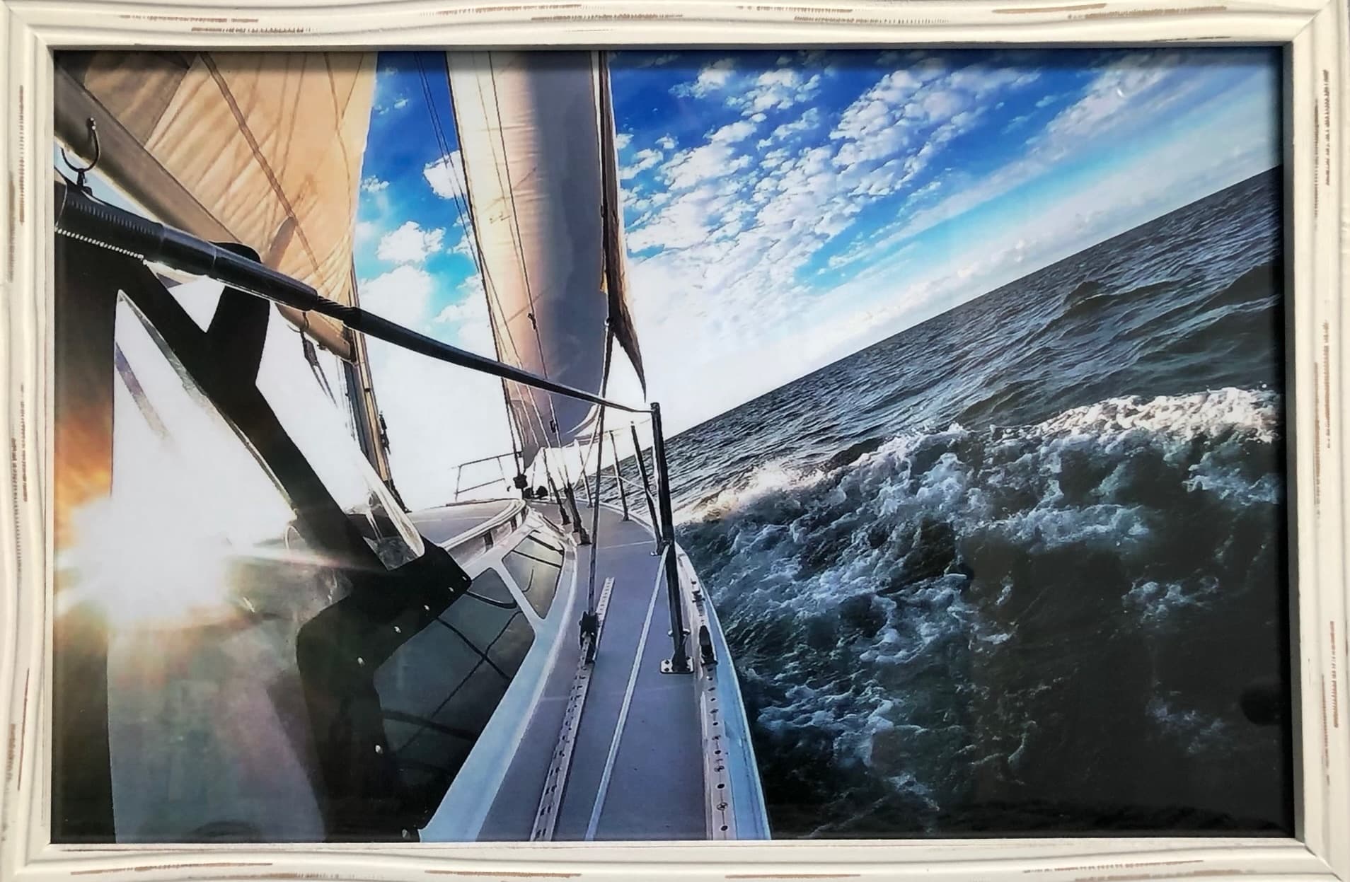 Sailing from cockpit view slicing through waves on Lake Erie