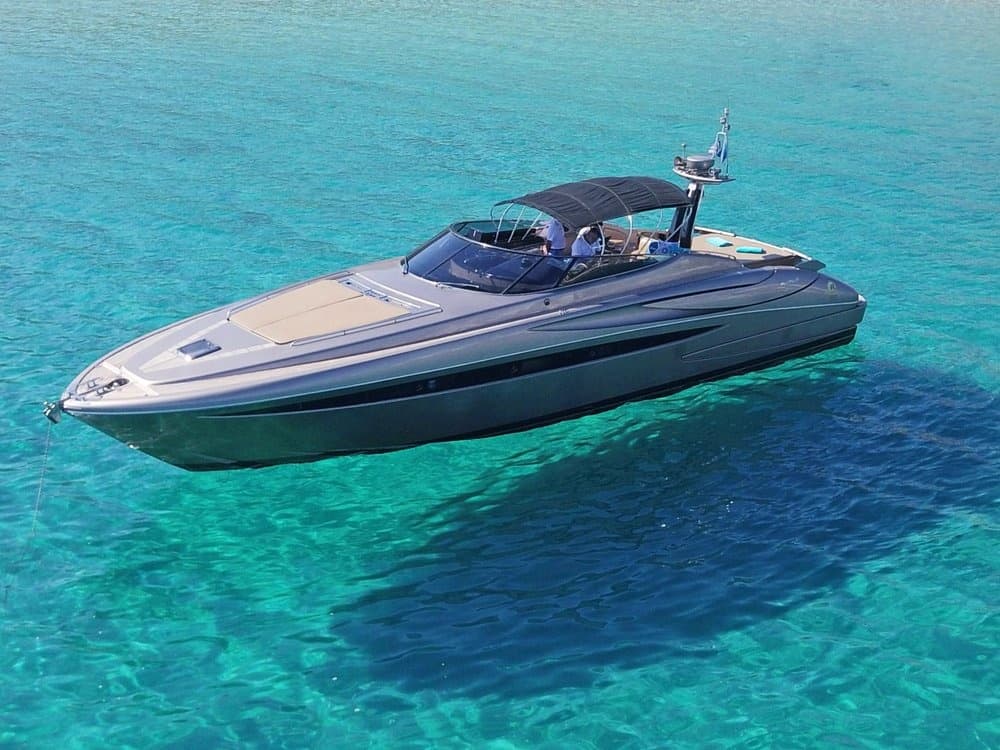 Luxury motor yacht cruising turquoise Mediterranean waters