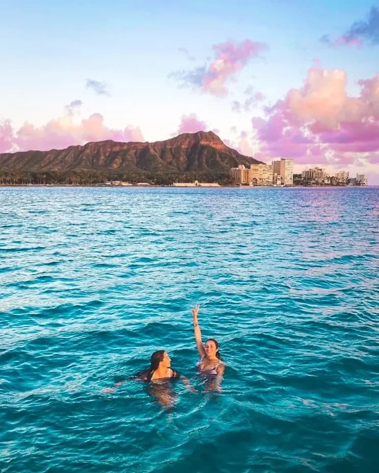 Waikiki Sunset Swim: Golden Hour Catamaran Cruise with Diamond Head Views photo 3