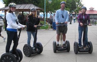 Guided Segway tour group on promenade in Granbury, Texas