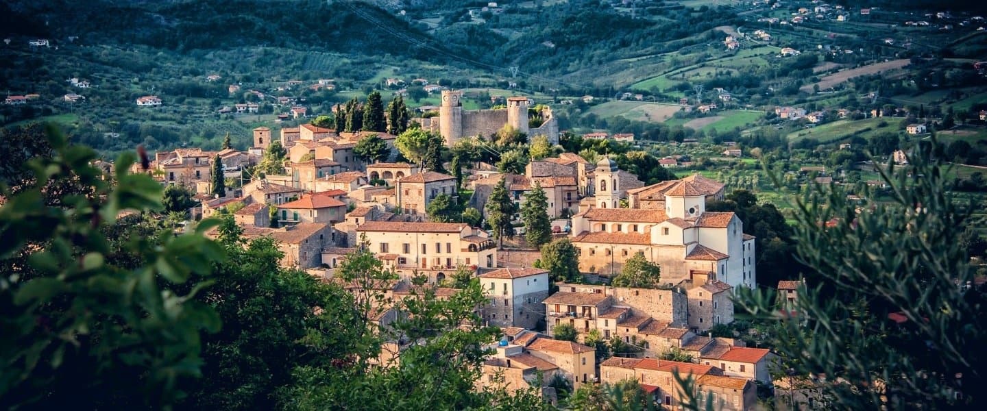 Panoramic hilltop village view in Tuscan countryside