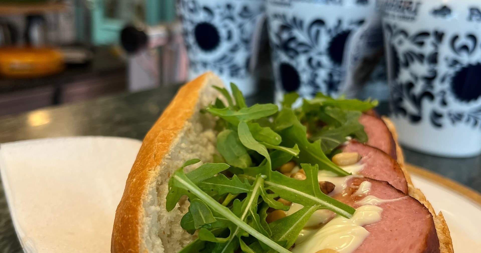 Open-faced sandwich with arugula, Dutch deli street food close-up