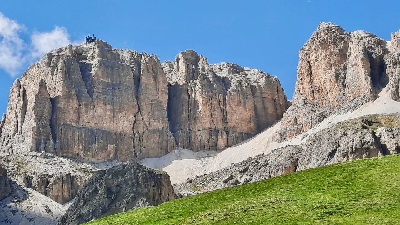 Private Tesla Day Escape to the Dolomites: Limestone Peaks, Emerald Lakes & Hidden Passes