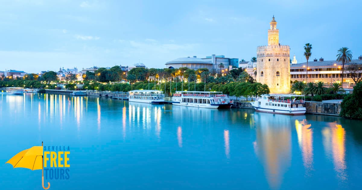 Torre del Oro reflecting on Guadalquivir River at dusk