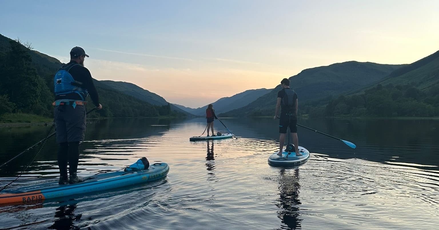 Paddleboarding at Loch Lomond with Roll Outdoors Ltd