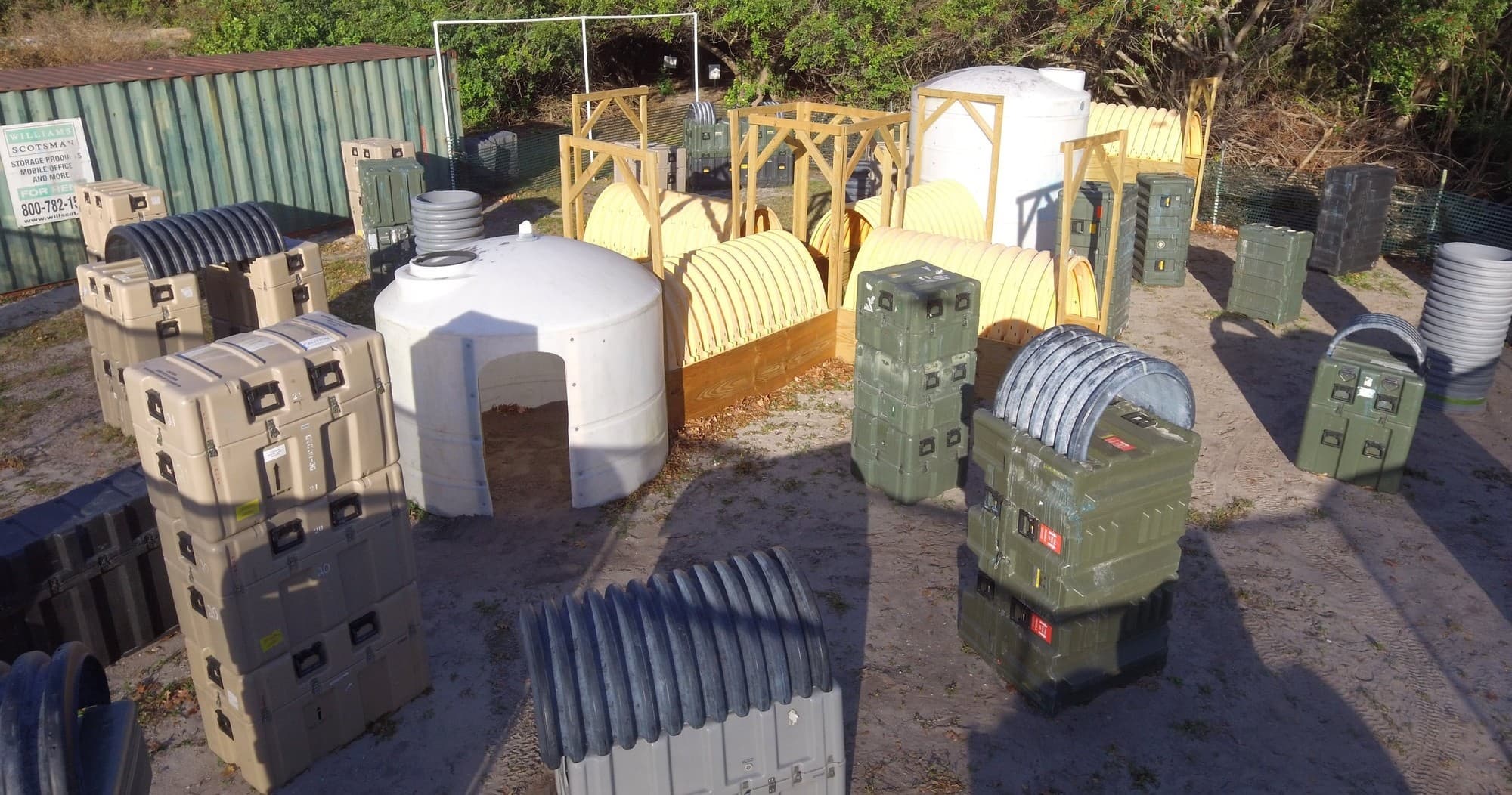 Outdoor paintball field aerial view with bunkers at Clearwater