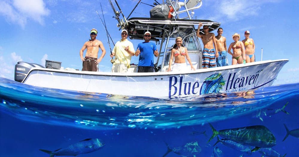 Blue Heaven sportfishing boat on clear ocean with anglers aboard