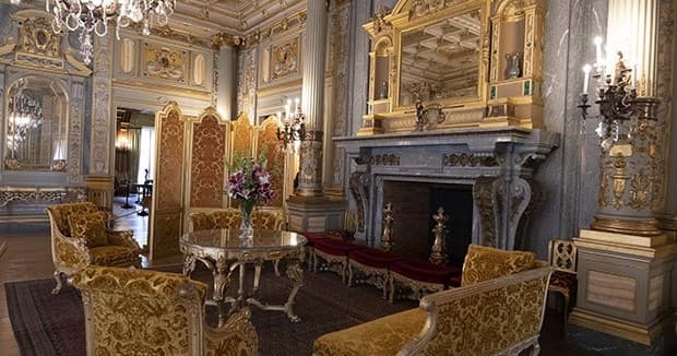 Ornate mansion parlor interior with gilded furnishings in Newport