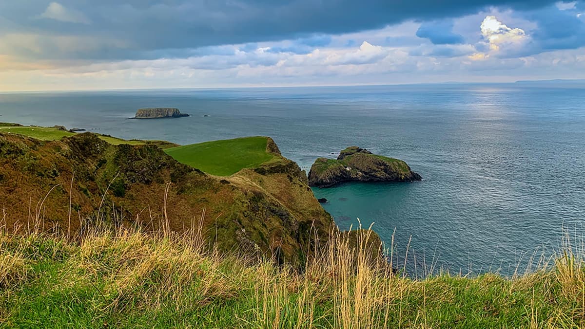Dramatic coastal cliffs and sea stacks, scenic Northern Ireland vista