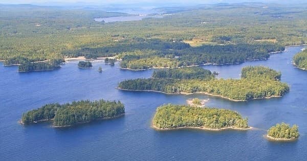 Aerial view of Sebago Lake islands and blue water landscape