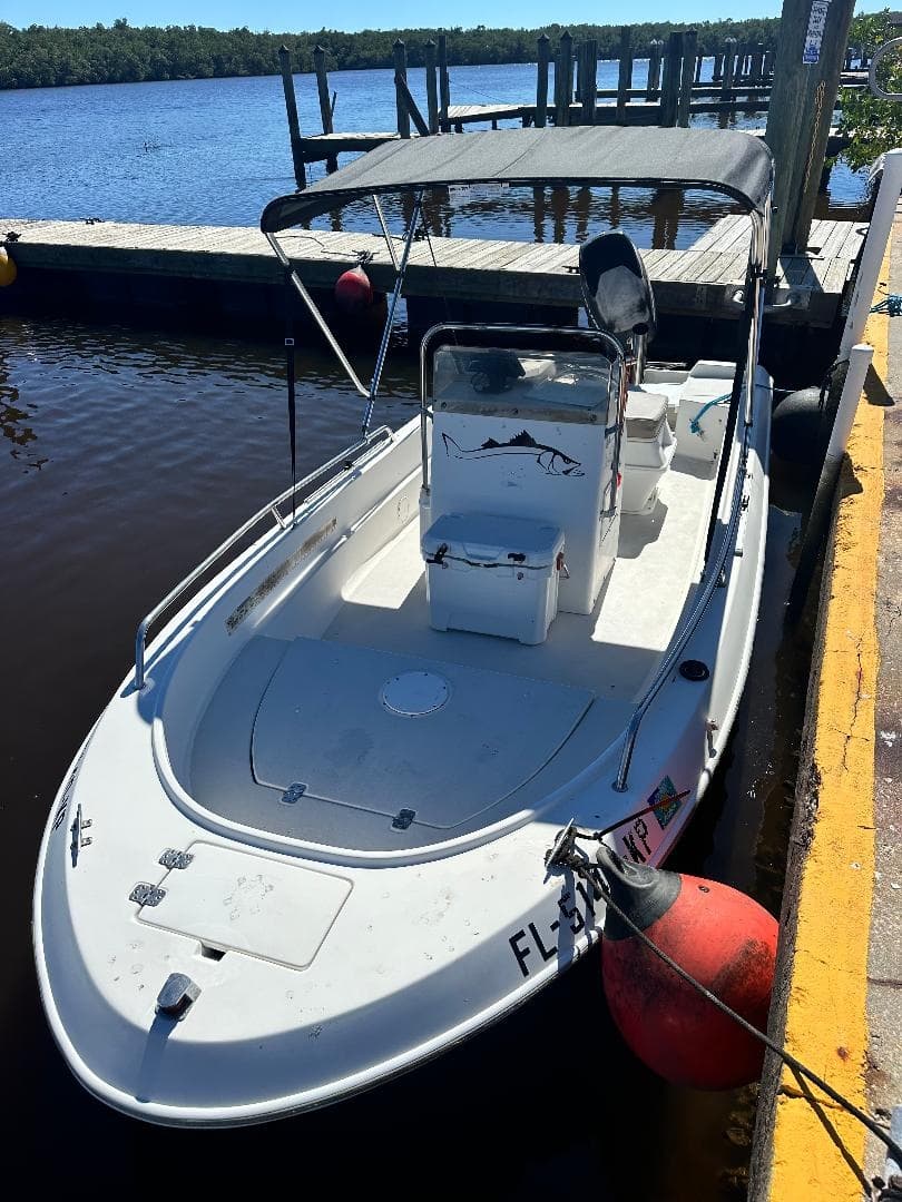 Bow view of rental skiff tied to dock in Everglades City
