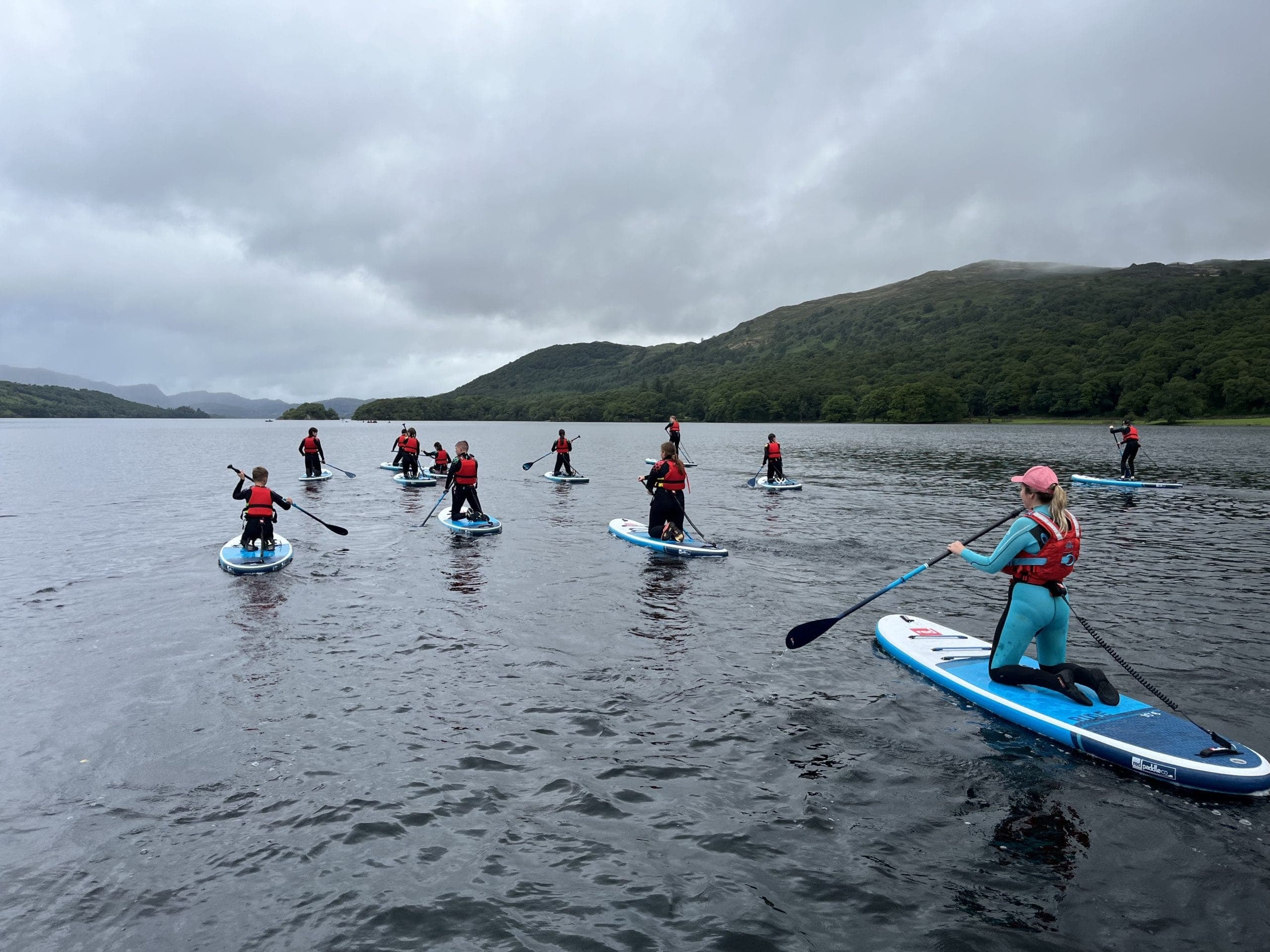 Glide and Learn: Guided Paddleboarding on Coniston Water with Genuine Adventures